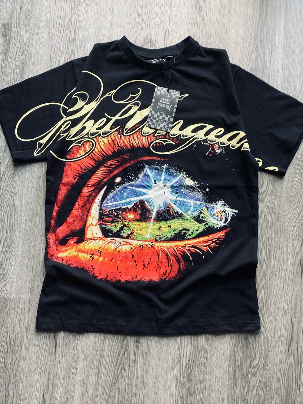rebels Black Tee with Red Eye and Multicolor Landscape Print